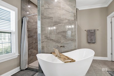 Discover exceptional coastal living in this stunning 3-bedroom on Peninsula Golf and Racquet Club in Alabama - for sale on GolfHomes.com, golf home, golf lot