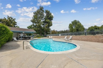 Enjoy your private patio and beautiful sunsets from this move-in on Azusa Greens Country Club in California - for sale on GolfHomes.com, golf home, golf lot