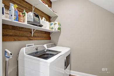 Discover exceptional coastal living in this stunning 3-bedroom on Peninsula Golf and Racquet Club in Alabama - for sale on GolfHomes.com, golf home, golf lot