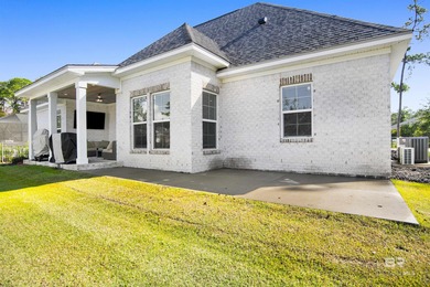 Discover exceptional coastal living in this stunning 3-bedroom on Peninsula Golf and Racquet Club in Alabama - for sale on GolfHomes.com, golf home, golf lot