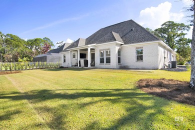 Discover exceptional coastal living in this stunning 3-bedroom on Peninsula Golf and Racquet Club in Alabama - for sale on GolfHomes.com, golf home, golf lot