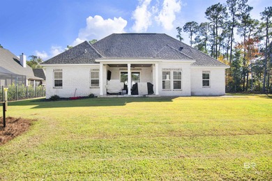 Discover exceptional coastal living in this stunning 3-bedroom on Peninsula Golf and Racquet Club in Alabama - for sale on GolfHomes.com, golf home, golf lot