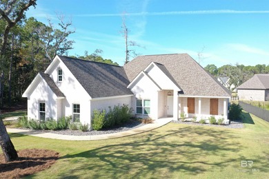 Discover exceptional coastal living in this stunning 3-bedroom on Peninsula Golf and Racquet Club in Alabama - for sale on GolfHomes.com, golf home, golf lot