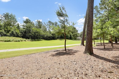 Residential parcel with mature trees set along the 3rd fairway on River Landing Golf Course in North Carolina - for sale on GolfHomes.com, golf home, golf lot