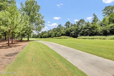 Residential parcel with mature trees set along the 3rd fairway on River Landing Golf Course in North Carolina - for sale on GolfHomes.com, golf home, golf lot