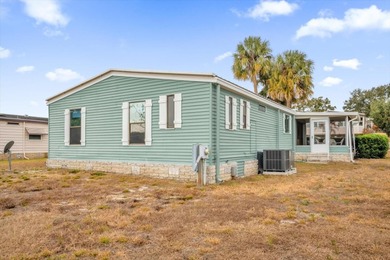 This Extra Clean, Bright home features 3 1/2 yrs old A/C, Metal on Zellwood Station Country Club in Florida - for sale on GolfHomes.com, golf home, golf lot