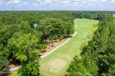 Residential parcel with mature trees set along the 3rd fairway on River Landing Golf Course in North Carolina - for sale on GolfHomes.com, golf home, golf lot