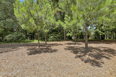 Residential parcel with mature trees set along the 3rd fairway on River Landing Golf Course in North Carolina - for sale on GolfHomes.com, golf home, golf lot