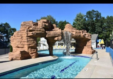 Welcome to your perfect getaway in the Dells! This bright and on Wild Rock Golf Course - Woods Family Executive in Wisconsin - for sale on GolfHomes.com, golf home, golf lot