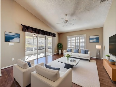 Canterbury model on a sloped golf course lot. that is heading to on Kings Ridge Golf Club in Florida - for sale on GolfHomes.com, golf home, golf lot