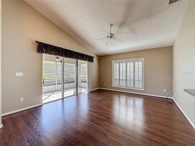 Canterbury model on a sloped golf course lot. that is heading to on Kings Ridge Golf Club in Florida - for sale on GolfHomes.com, golf home, golf lot