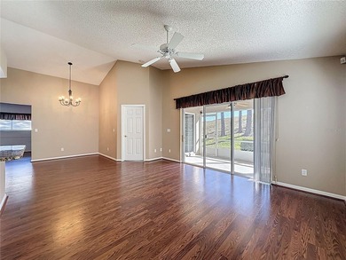 Canterbury model on a sloped golf course lot. that is heading to on Kings Ridge Golf Club in Florida - for sale on GolfHomes.com, golf home, golf lot