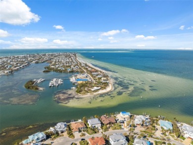 Exquisite Waterfront Luxury Home with Breathtaking Gulf Views on Key Royale Club in Florida - for sale on GolfHomes.com, golf home, golf lot
