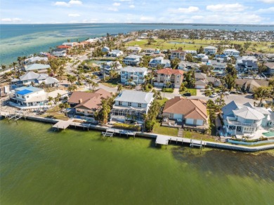 Exquisite Waterfront Luxury Home with Breathtaking Gulf Views on Key Royale Club in Florida - for sale on GolfHomes.com, golf home, golf lot