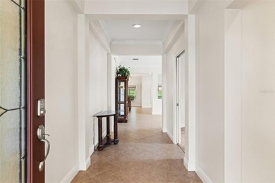 Welcome to an exceptional expression of refined Florida living on Southern Hills Plantation Club in Florida - for sale on GolfHomes.com, golf home, golf lot