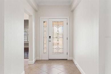 Welcome to an exceptional expression of refined Florida living on Southern Hills Plantation Club in Florida - for sale on GolfHomes.com, golf home, golf lot