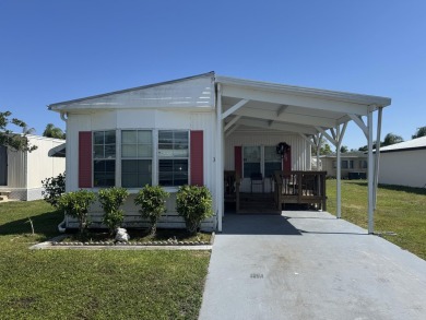 Check out this cute 2 BED 2 BATH double wide manufactured home on Spanish Lakes I in Florida - for sale on GolfHomes.com, golf home, golf lot