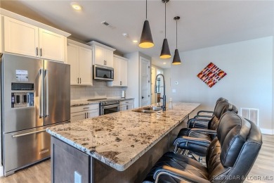This newly constructed condo at Mile Marker 13 is an ideal on Seasons Ridge At Four Seasons in Missouri - for sale on GolfHomes.com, golf home, golf lot