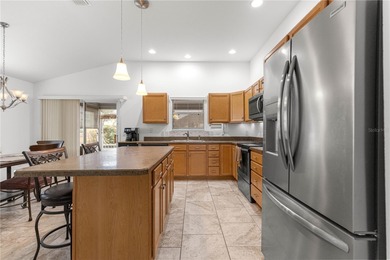 Welcome to this stunning Cottage-Style Seabreeze floorplan on Bella Glade Country Club in Florida - for sale on GolfHomes.com, golf home, golf lot