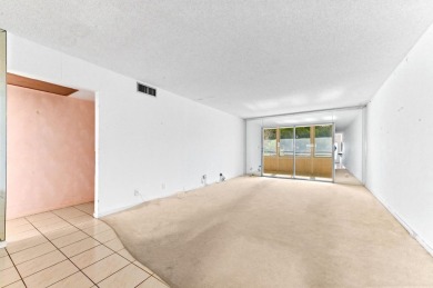 Quiet unit but close to Elevator, and nearby the laundry room on Wynmoor Golf Course in Florida - for sale on GolfHomes.com, golf home, golf lot