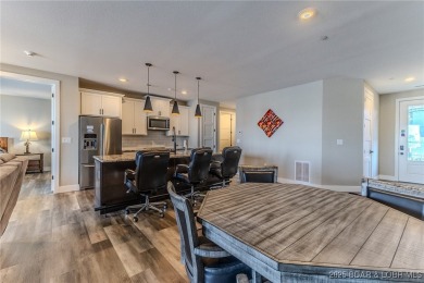 This newly constructed condo at Mile Marker 13 is an ideal on Seasons Ridge At Four Seasons in Missouri - for sale on GolfHomes.com, golf home, golf lot