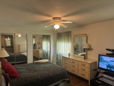 Check out this cute 2 BED 2 BATH double wide manufactured home on Spanish Lakes I in Florida - for sale on GolfHomes.com, golf home, golf lot