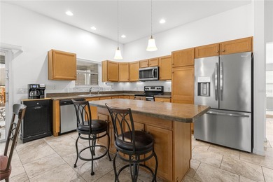 Welcome to this stunning Cottage-Style Seabreeze floorplan on Bella Glade Country Club in Florida - for sale on GolfHomes.com, golf home, golf lot