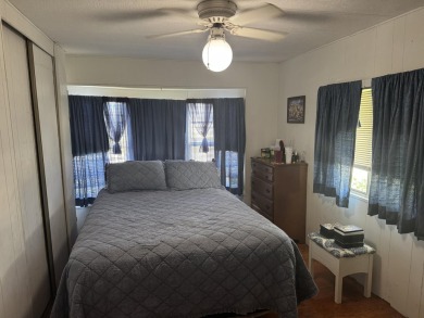 Check out this cute 2 BED 2 BATH double wide manufactured home on Spanish Lakes I in Florida - for sale on GolfHomes.com, golf home, golf lot
