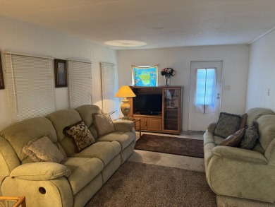 Check out this cute 2 BED 2 BATH double wide manufactured home on Spanish Lakes I in Florida - for sale on GolfHomes.com, golf home, golf lot