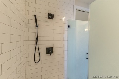 This newly constructed condo at Mile Marker 13 is an ideal on Seasons Ridge At Four Seasons in Missouri - for sale on GolfHomes.com, golf home, golf lot