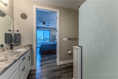 This newly constructed condo at Mile Marker 13 is an ideal on Seasons Ridge At Four Seasons in Missouri - for sale on GolfHomes.com, golf home, golf lot