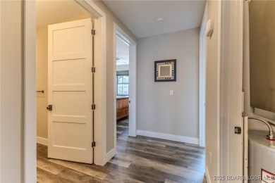 This newly constructed condo at Mile Marker 13 is an ideal on Seasons Ridge At Four Seasons in Missouri - for sale on GolfHomes.com, golf home, golf lot