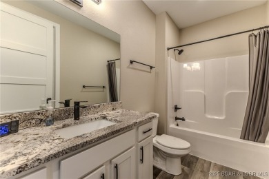 This newly constructed condo at Mile Marker 13 is an ideal on Seasons Ridge At Four Seasons in Missouri - for sale on GolfHomes.com, golf home, golf lot