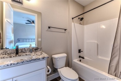 This newly constructed condo at Mile Marker 13 is an ideal on Seasons Ridge At Four Seasons in Missouri - for sale on GolfHomes.com, golf home, golf lot
