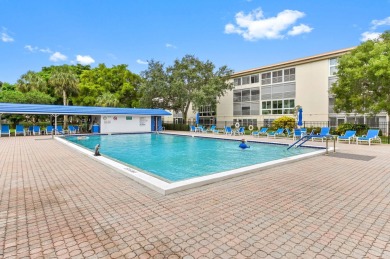 Quiet unit but close to Elevator, and nearby the laundry room on Wynmoor Golf Course in Florida - for sale on GolfHomes.com, golf home, golf lot