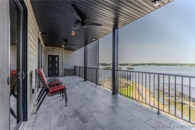 This newly constructed condo at Mile Marker 13 is an ideal on Seasons Ridge At Four Seasons in Missouri - for sale on GolfHomes.com, golf home, golf lot