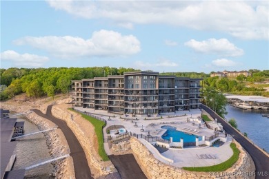 This newly constructed condo at Mile Marker 13 is an ideal on Seasons Ridge At Four Seasons in Missouri - for sale on GolfHomes.com, golf home, golf lot