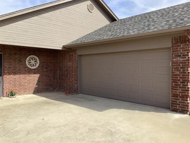 Welcome to this stunning half duplex nestled along the greens of on Holiday Hills Country Club in Texas - for sale on GolfHomes.com, golf home, golf lot