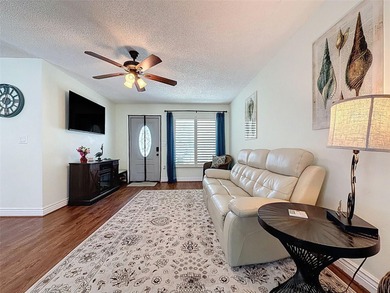 Check out this amazing single-story condo in a pet-friendly 55+ on Summertree Golf Course in Florida - for sale on GolfHomes.com, golf home, golf lot
