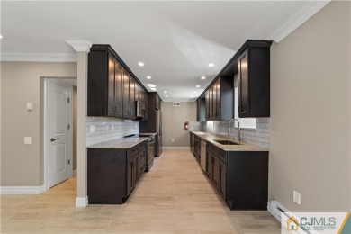 The gorgeous Rutledge model has undergone extensive renovations on Clearbrook Golf Club in New Jersey - for sale on GolfHomes.com, golf home, golf lot