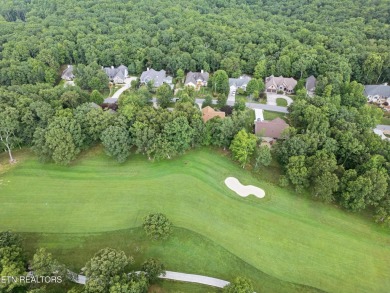 As you enter the home you're welcomed by Cathedral ceilings, and on Stonehenge Golf Course in Tennessee - for sale on GolfHomes.com, golf home, golf lot
