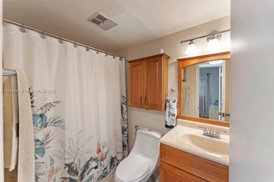 Great first floor 2/2 condo located in the 55+ community of on Sunrise Lakes Phase III in Florida - for sale on GolfHomes.com, golf home, golf lot