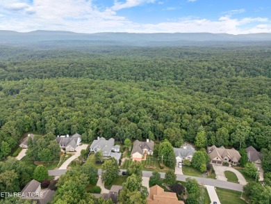 As you enter the home you're welcomed by Cathedral ceilings, and on Stonehenge Golf Course in Tennessee - for sale on GolfHomes.com, golf home, golf lot
