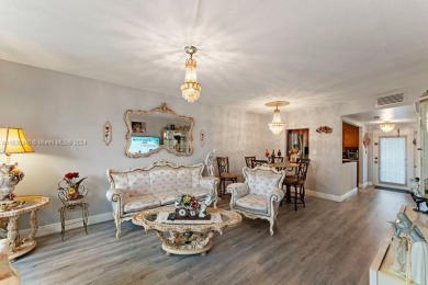 Great first floor 2/2 condo located in the 55+ community of on Sunrise Lakes Phase III in Florida - for sale on GolfHomes.com, golf home, golf lot