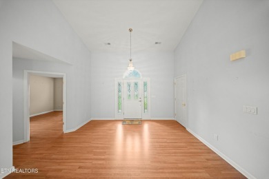 As you enter the home you're welcomed by Cathedral ceilings, and on Stonehenge Golf Course in Tennessee - for sale on GolfHomes.com, golf home, golf lot