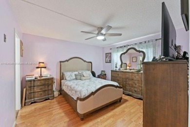 Great first floor 2/2 condo located in the 55+ community of on Sunrise Lakes Phase III in Florida - for sale on GolfHomes.com, golf home, golf lot