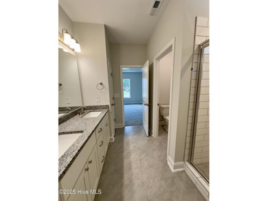 Welcome to your dream home! This stunning 2,352 square foot on Woodlake Country Club in North Carolina - for sale on GolfHomes.com, golf home, golf lot