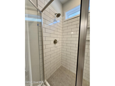 Welcome to your dream home! This stunning 2,352 square foot on Woodlake Country Club in North Carolina - for sale on GolfHomes.com, golf home, golf lot