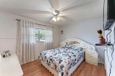 Great first floor 2/2 condo located in the 55+ community of on Sunrise Lakes Phase III in Florida - for sale on GolfHomes.com, golf home, golf lot