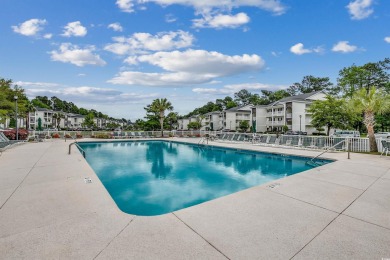 Welcome to this charming two-bedroom, two-bath condo in the on River Oaks Golf Plantation  in South Carolina - for sale on GolfHomes.com, golf home, golf lot